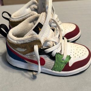Multi color Jordan ones, wore a lot, still in good condition